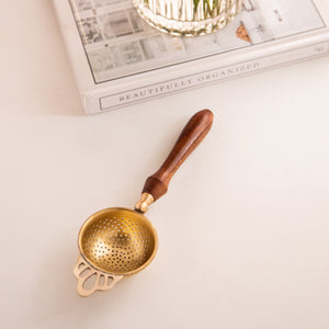 
                  
                    Load image into Gallery viewer, Octavius Premium Brass Tea Strainer with wooden handle ( 5 cms base diameter)
                  
                