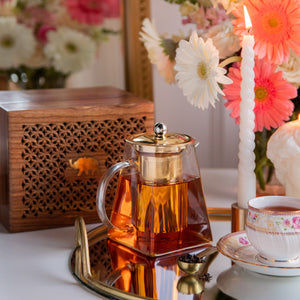 
                  
                    Load image into Gallery viewer, Pyramid Shape Borosilicate Teapot With Gold Plated Infuser And Lid in a Sesham Wood Box- 720 ML
                  
                